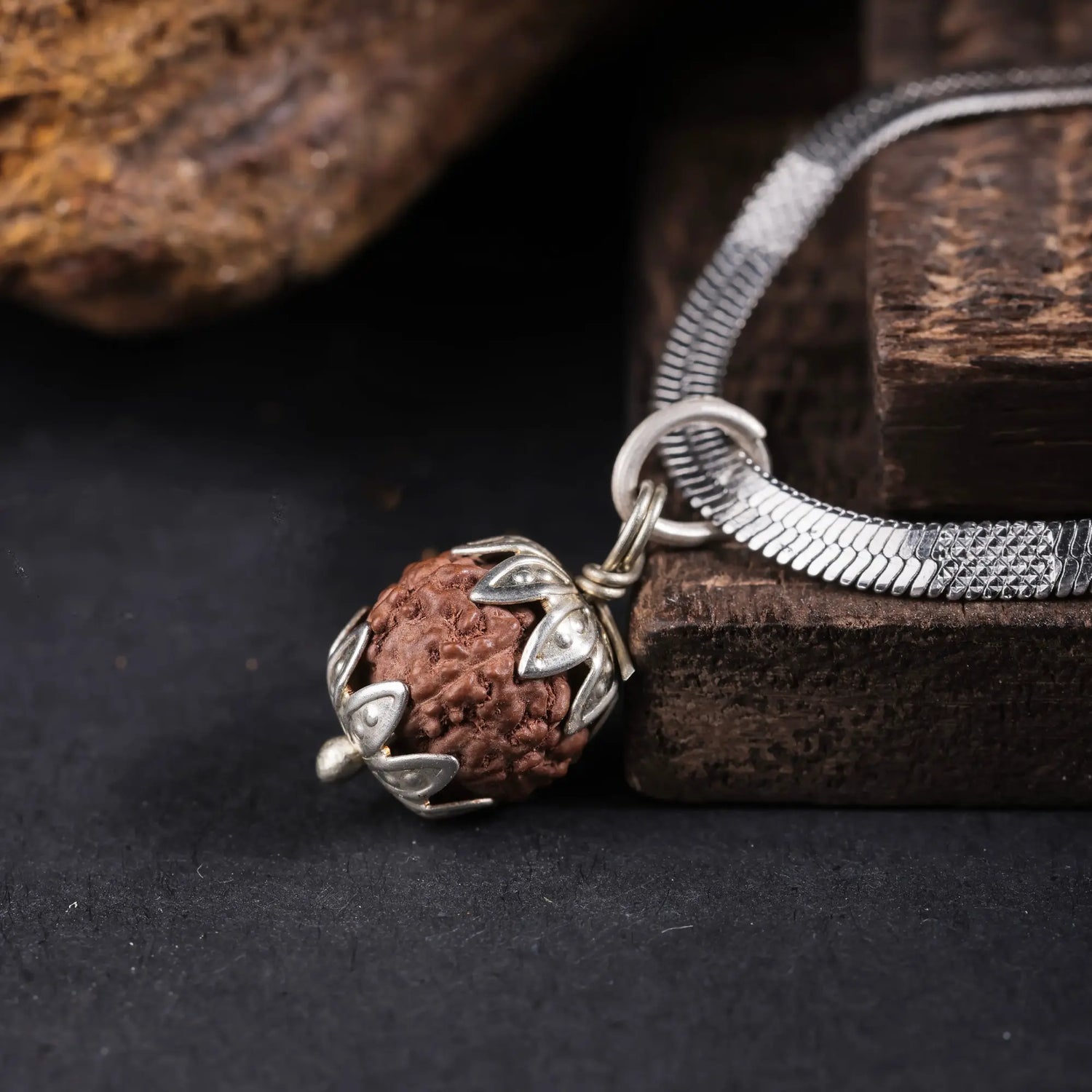 Indonesian Rudraksha Bead Pendant with Silver Cap