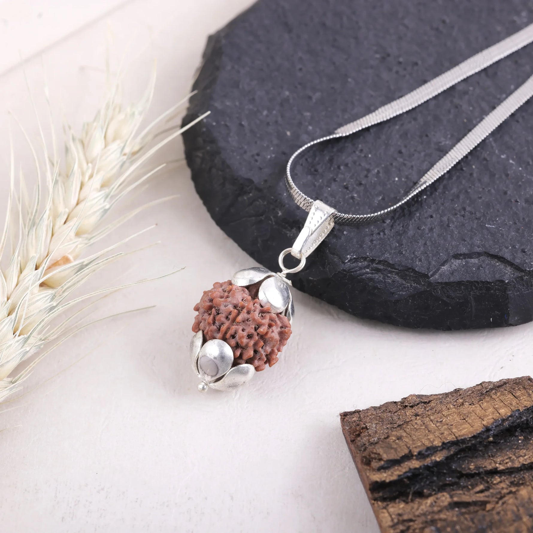 7 Mukhi Rudraksha silver cap pendant flat lay — buy original rudraksha pendant online India